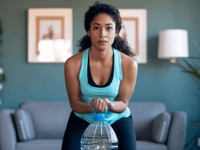 Full body workout using water bottles as weights Full body workout using water bottles as weights